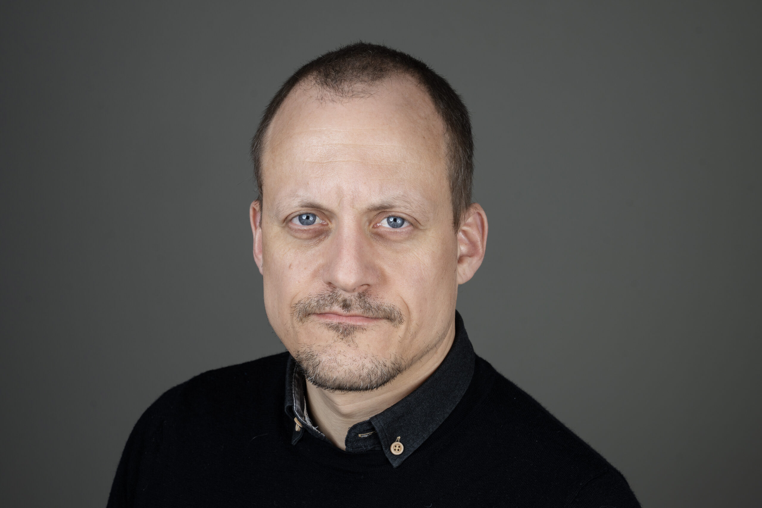 Portrettbilde av avdelingssekretær Thomas Rasmussen